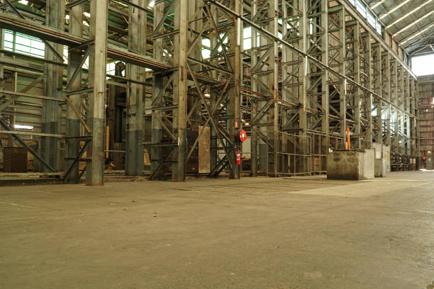 istock Interior view of generic rusty machinery factory 1125609598