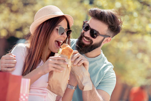 istock Happy couple having breakfast outdoors 1125610651