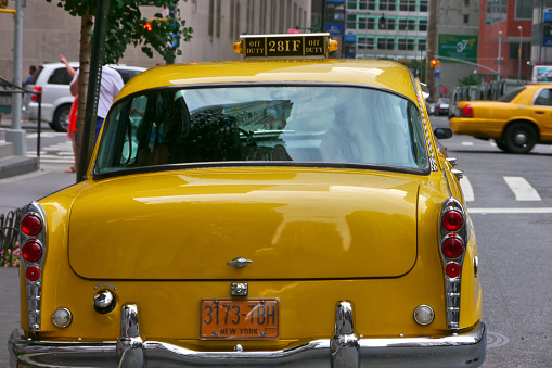 New York City, NY / USA - August 2012: A vintage Taxicab at Lower Manhattan