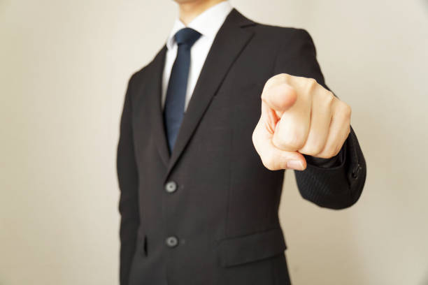 istock Businessmen pointing fingers. 1125611666