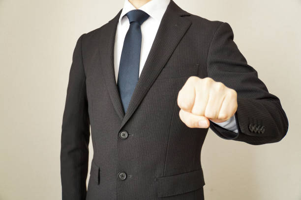istock Businessman to make a fist pump. 1125611708