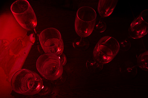 many glasses in neon light. party concept