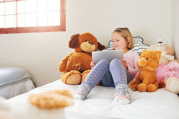 istock It's tradition for her to watch cartoons with teddy every weekend 1125617540