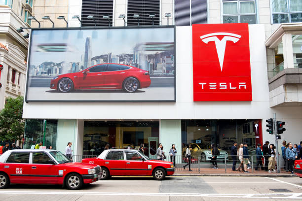 carro americano companhia elétrica tesla motors showroom de loja oficial em hong kong - tesla - fotografias e filmes do acervo