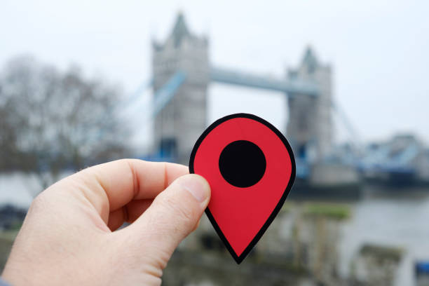 istock man with a red marker in Tower Bridge, London, UK 1125618182
