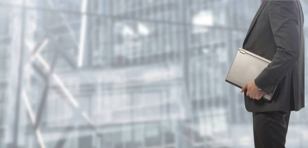 istock Business man with laptop 1125619625