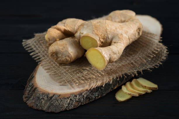 istock root of fresh ginger on a wooden background 1125621612