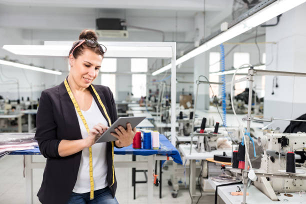 istock Small business owner posing with tablet. 1125622053