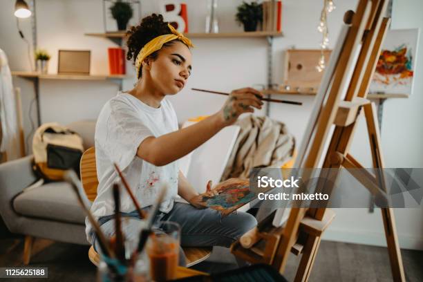 Girl Painting On Canvas Stock Photo - Download Image Now - Painting - Activity, Hobbies, Artist
