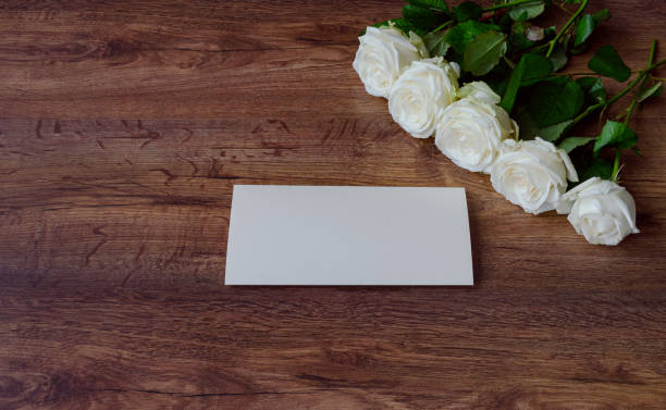 istock rose flowers on a wooden background 1125625632