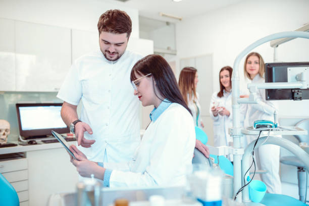 istock Dentists Working On New Results From Latest Surgical Procedures 1125628449