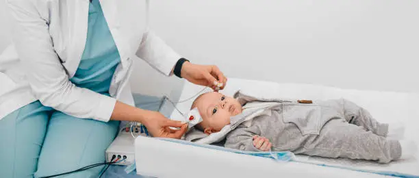 Photo of Hearing Test baby , Cortical auditory evoked potential analyzer. hearing screening