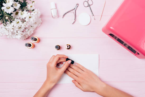istock View from above process of painting nails 1125631646