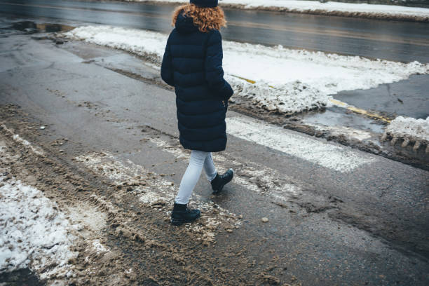 Young woman dressed in coat