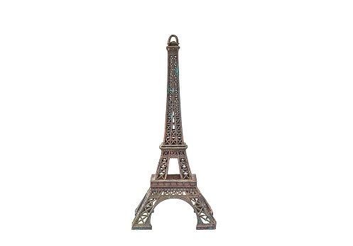 Vintage metal Eiffel Tower statue isolated on a white background