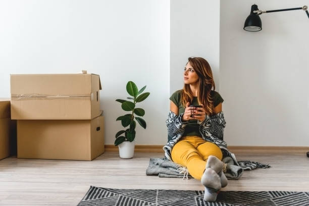 istock Enjoying Coffee in new apartment 1125633594