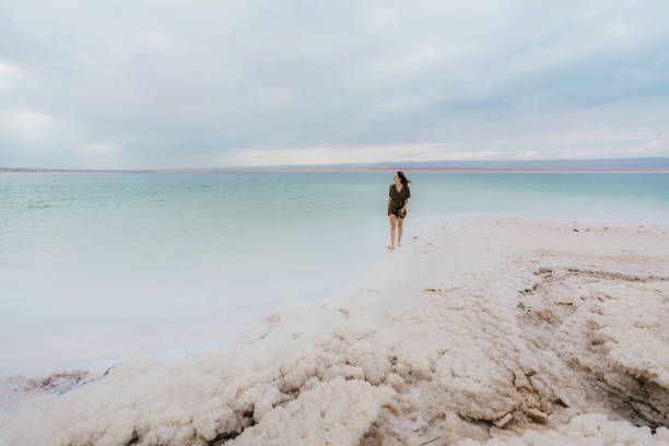 istock Woman resting near Dead Sea 1125634286