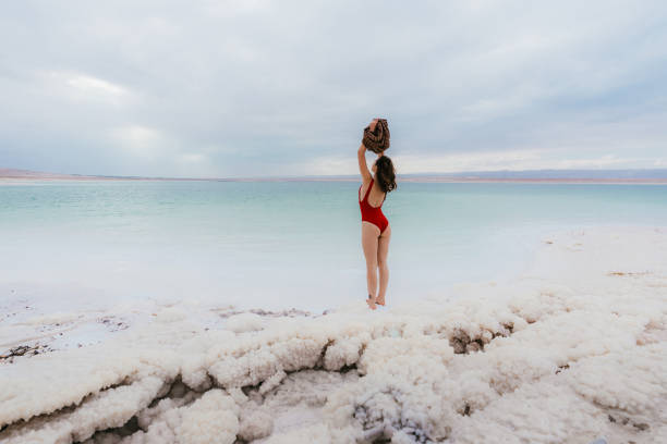 istock Woman resting near Dead Sea 1125635682
