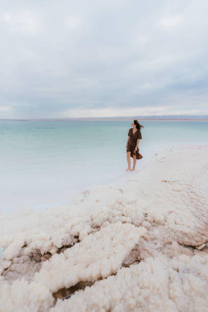 istock Woman resting near Dead Sea 1125635683