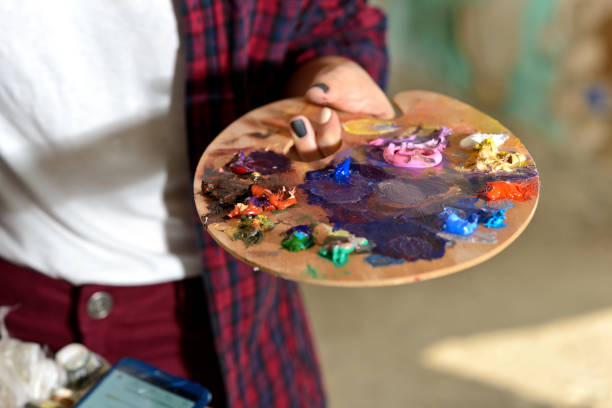 istock Wooden palette with oil paints 1125638685