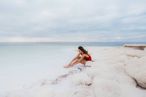 istock Woman resting near Dead Sea 1125638722