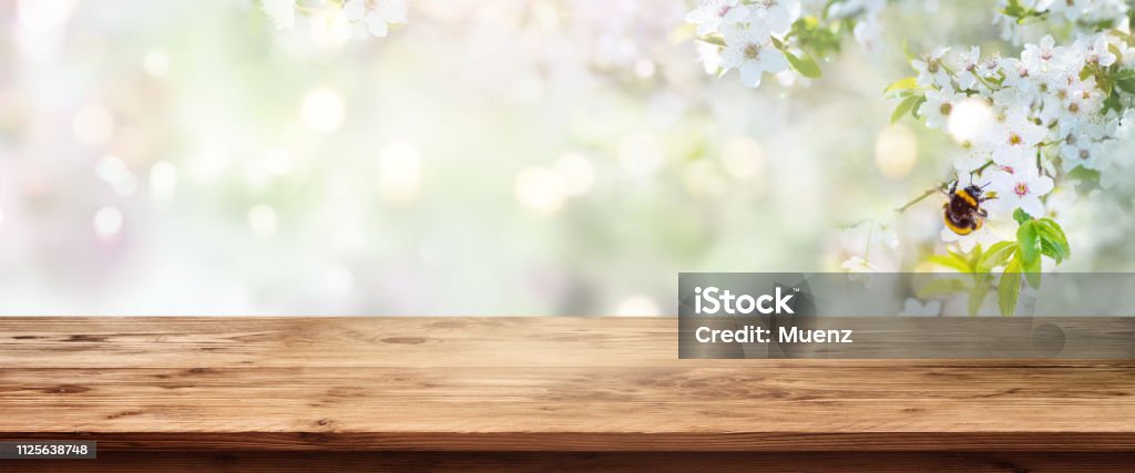 Spring Scenery With Wooden Table Stock Photo - Download Image Now -  Springtime, Table, Backgrounds - iStock