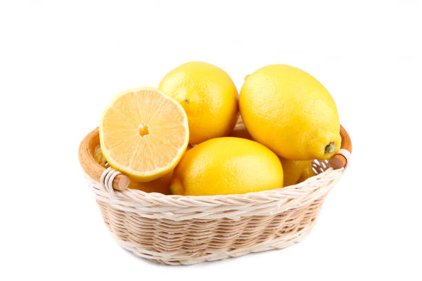 istock Lemon in basket isolated on white background. Tropical fruit. 1125638767