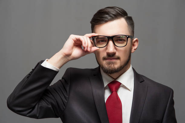 istock Serious businessman in formal suit and glasses 1125638871