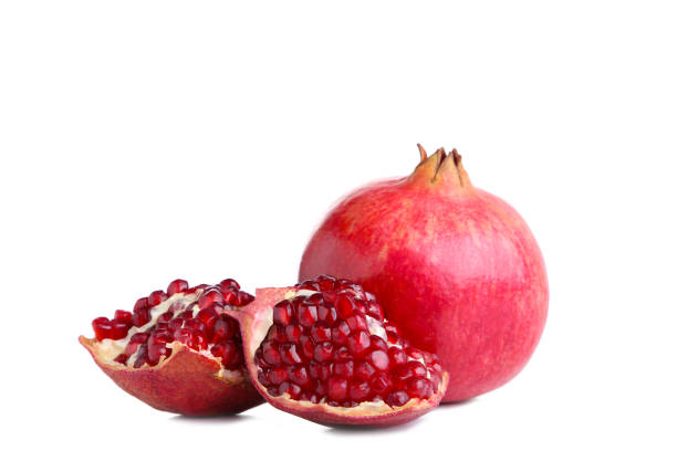 istock Ripe pomegranates isolated on a white background 1125639048