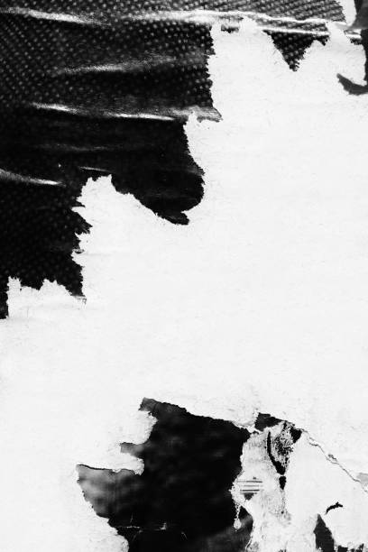 istock Blank white black old ripped torn paper crumpled creased posters grunge textures backdrop backgrounds placard 1125640444