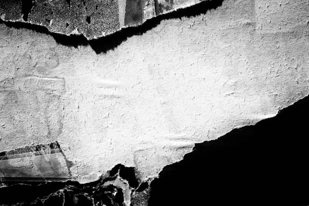 istock Blank white black old ripped torn paper crumpled creased posters grunge textures backdrop backgrounds placard 1125640682