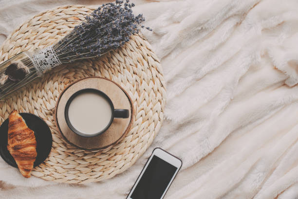 istock Mug with coffee and home decor on tray 1125640961