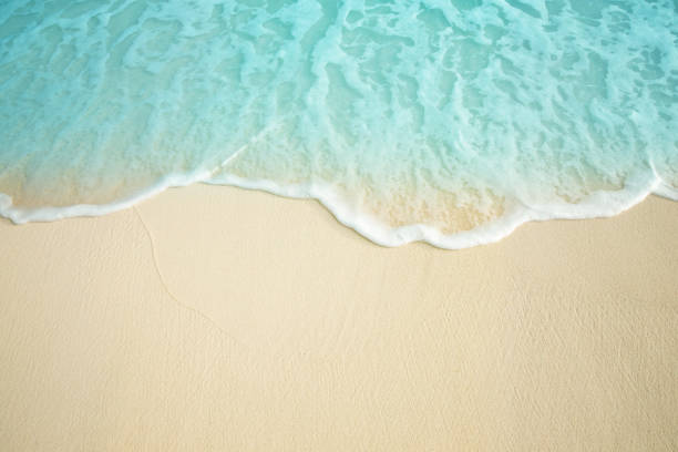 istock Sea wave on the sandy beach. 1125641265