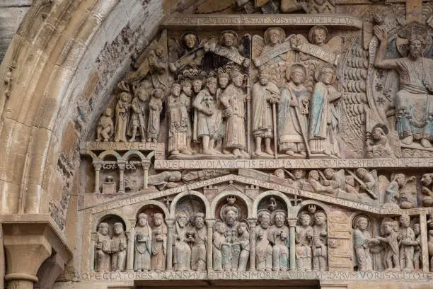 Image of a part of the tympanum of the Abbey of Conques that represents the Final Judgment