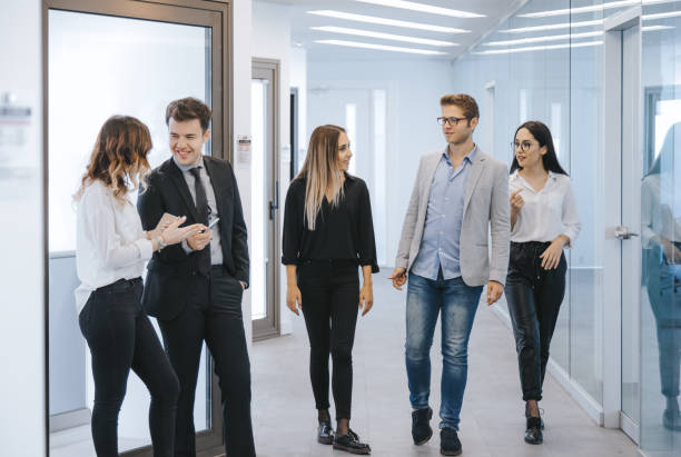 istock Business people walking on the office corridor 1125644368