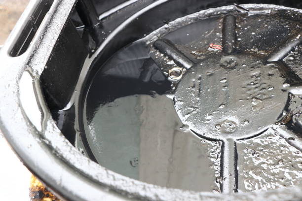 istock engine oil and oil cans in a car garage 1125645006
