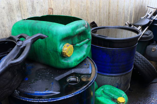 istock engine oil and oil cans in a car garage 1125645607