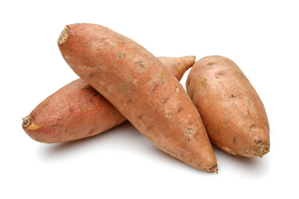 istock Whole sweet potatoes on white background 1125645982