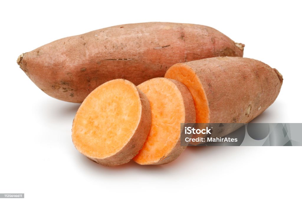 Sweet potato with slices Sweet potato with slices isolated on white background Sweet Potato Stock Photo