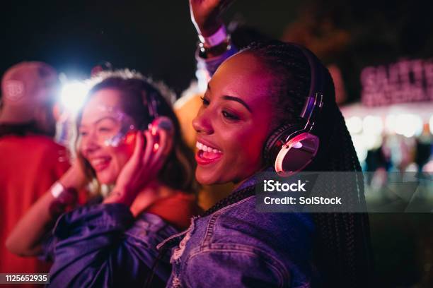 Friends Dancing In A Silent Disco Stock Photo - Download Image Now - Nightclub, Disco Dancing, Silence