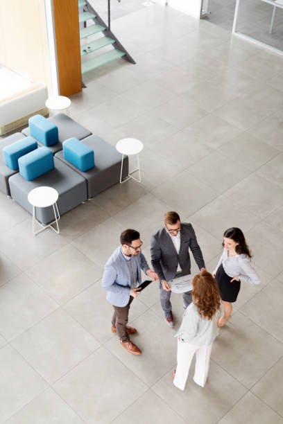 istock Group of business people collaborating in office 1125653567