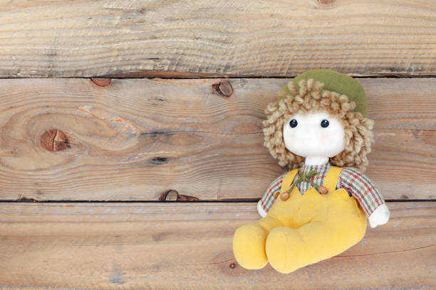 istock Old toy on the old wood background,Top view 1125655601