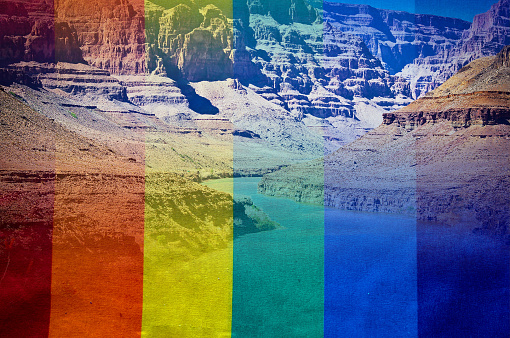 Merged image of the Grand Canyon and rainbow flag merged in transition layers.