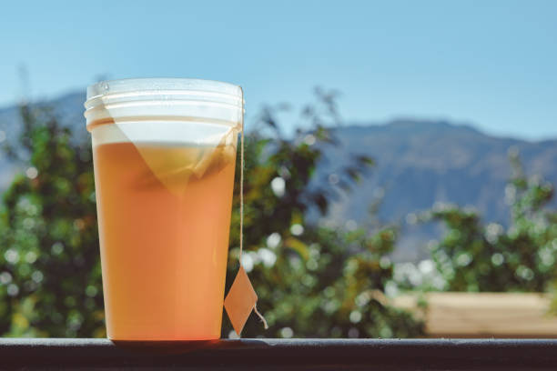 istock a Cup of tea on a background of mountains 1125657922