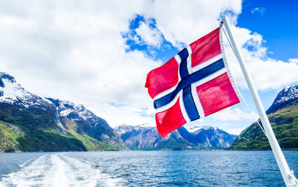 istock Norwegian Flag with beautiful background 1125659185