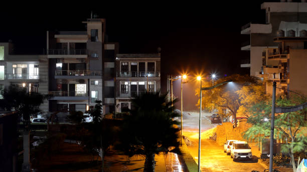 istock Modern city at night during rainy season 1125662295