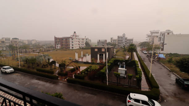 istock City during rainy season perspective view 1125662327