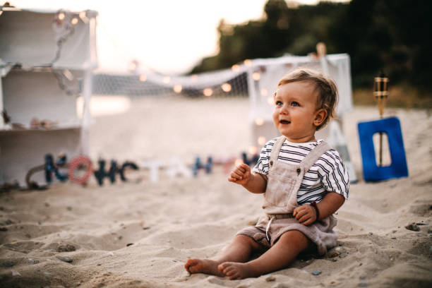 istock Blue eye baby at beach 1125663068