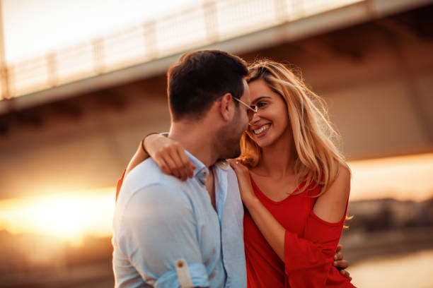 istock Happy young couple having fun outdoors 1125667499