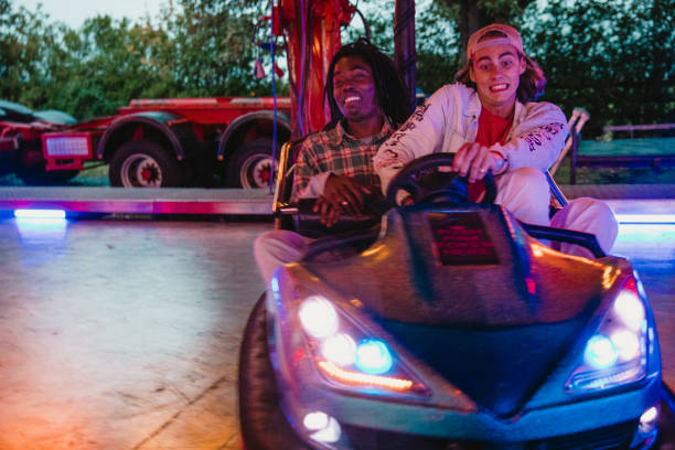 istock Young Men on the Dodgems 1125669472
